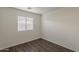 Bright bedroom with wood-look floors and natural light creates a relaxing, stylish retreat at 1615 W Hidalgo Ave, Phoenix, AZ 85041