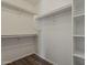 Spacious walk-in closet with shelving and ample storage, perfect for organizing your wardrobe at 1615 W Hidalgo Ave, Phoenix, AZ 85041