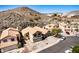 Residential neighborhood featuring houses with tile roofs, mountain views, and convenient street parking at 16834 S 20Th Pl, Phoenix, AZ 85048