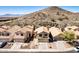 Neighborhood overview showcasing well-maintained homes with desert landscaping and mountain backdrop at 16834 S 20Th Pl, Phoenix, AZ 85048
