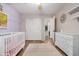Bright Bedroom with modern furniture and decor, ceiling fan, and an abundance of natural light at 16834 S 20Th Pl, Phoenix, AZ 85048