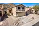 Beautiful two-story home with a two-car garage, landscaped front yard, and a welcoming entrance, showcasing curb appeal at 16834 S 20Th Pl, Phoenix, AZ 85048