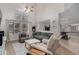 Bright living room with high ceilings, large windows, and stylish furnishings, creating a cozy and inviting space at 16834 S 20Th Pl, Phoenix, AZ 85048