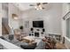 Inviting living room with vaulted ceilings, neutral tones, and stylish furnishings, creating a warm and welcoming atmosphere at 16834 S 20Th Pl, Phoenix, AZ 85048