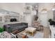 Comfortable living room with modern decor, plush seating, and ample natural light, perfect for relaxation and entertainment at 16834 S 20Th Pl, Phoenix, AZ 85048