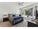 Bright bedroom with a large bay window that offers great views and ample natural light at 16913 W Cortaro Point Dr, Surprise, AZ 85387