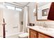Clean and functional bathroom with a tub-shower combination and mirrored medicine cabinet at 17200 W Bell Rd # 2221, Surprise, AZ 85374