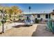 Well-maintained yard featuring a golf cart, desert landscaping, and a covered porch at 17200 W Bell Rd # 2221, Surprise, AZ 85374