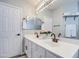 Stylish bathroom featuring a double vanity, modern fixtures, and ample counter space, exuding sophistication at 17526 W Coyote Trail Dr, Goodyear, AZ 85338