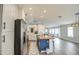Modern kitchen featuring a butcher block island, stainless steel appliances, and stylish finishes at 17526 W Coyote Trail Dr, Goodyear, AZ 85338