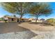Large backyard showcasing the desert landscaping and spacious lot at 1847 Leisure World --, Mesa, AZ 85206