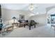 Comfortable living room featuring neutral tones, carpet flooring, and classic furnishings at 1847 Leisure World --, Mesa, AZ 85206