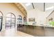 Welcoming lobby with arched windows, a front desk, and a view of the entrance at 1847 Leisure World --, Mesa, AZ 85206