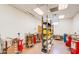 A bright studio showcases multiple kilns and shelving, offering ample space for creative endeavors at 1847 Leisure World --, Mesa, AZ 85206