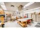 Well-lit workshop showcasing woodworking tables, tool storage, and work benches at 1847 Leisure World --, Mesa, AZ 85206