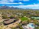Aerial view of community featuring tennis courts and pool at 18519 N 94Th St, Scottsdale, AZ 85255