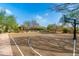 Outdoor basketball court with well-maintained court and hoops at 18519 N 94Th St, Scottsdale, AZ 85255