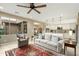 Bright living space featuring modern decor, neutral tones, and an open layout connecting to the kitchen at 18519 N 94Th St, Scottsdale, AZ 85255