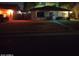 Charming single-story home featuring a well-maintained lawn, a covered front porch, and a single-car garage at 2045 W Orange Dr, Phoenix, AZ 85015