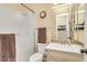 Tidy bathroom with a glass-enclosed shower, a vanity with storage, and updated fixtures at 20520 E Mockingbird Dr, Queen Creek, AZ 85142