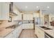 Modern kitchen design with stainless steel appliances, ample counter space, and a view of the living area at 20520 E Mockingbird Dr, Queen Creek, AZ 85142