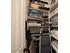 Organized storage closet with shelves filled with boxes and bins at 20520 E Mockingbird Dr, Queen Creek, AZ 85142