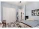 Bedroom with blue walls, carpet flooring, coordinated decor and closet at 20652 W Clearstream Dr, Buckeye, AZ 85396