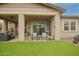 Spacious covered patio with views of low maintenance backyard at 20652 W Clearstream Dr, Buckeye, AZ 85396