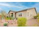 Well-maintained home exterior shows the covered patio and desert landscaping at 20652 W Clearstream Dr, Buckeye, AZ 85396