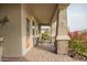 Inviting front porch with comfortable seating and decorative touches for relaxed outdoor living at 20652 W Clearstream Dr, Buckeye, AZ 85396