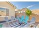 Cozy backyard featuring comfortable seating around a fire pit, perfect for relaxing and enjoying the outdoors at 21090 E Camina Buena Vis, Queen Creek, AZ 85142