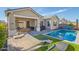 Spacious backyard featuring a sparkling pool, inviting patio area, and comfortable lounge chairs and hammocks at 21090 E Camina Buena Vis, Queen Creek, AZ 85142