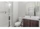 Bathroom with a walk-in shower, a single sink, and tile flooring at 21090 E Camina Buena Vis, Queen Creek, AZ 85142