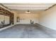 Spacious two-car garage, offering ample room for parking and storage or workshop at 21090 E Camina Buena Vis, Queen Creek, AZ 85142