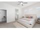 Bright and airy main bedroom with an ensuite bathroom at 21090 E Camina Buena Vis, Queen Creek, AZ 85142