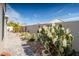 Backyard featuring desert landscaping, rock beds, and a brick perimeter at 21901 N Sonora Ln, Sun City West, AZ 85375