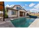 Well-maintained backyard showcasing a swimming pool and patio, perfect for outdoor entertainment at 2423 N Beverly Pl, Buckeye, AZ 85396