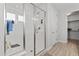 Bright bathroom features a large glass walk-in shower at 2423 N Beverly Pl, Buckeye, AZ 85396