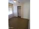 Cozy bedroom featuring neutral walls, carpet floors, a ceiling fan, and a closet with sliding doors at 24930 W Dove Mesa Dr, Buckeye, AZ 85326