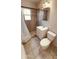 Bathroom featuring tile floors and shower, with a toilet and sink at 2502 W Jefferson St, Phoenix, AZ 85009