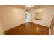 Bright bedroom featuring neutral walls, closet, and doorway to the bathroom at 2502 W Jefferson St, Phoenix, AZ 85009