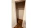 Walk-in closet with a neutral paint and rod for hanging clothes at 2502 W Jefferson St, Phoenix, AZ 85009