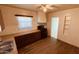 Cozy kitchen featuring white appliances, wood-look flooring, and light-colored walls at 2502 W Jefferson St, Phoenix, AZ 85009