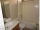 Standard bathroom with single sink, vanity, and shower/tub combination at 2637 S 156Th Ave, Goodyear, AZ 85338