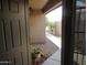 Inviting front entrance with a security door and low-maintenance gravel landscaping at 2637 S 156Th Ave, Goodyear, AZ 85338