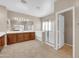 Spacious bathroom featuring separate vanities, a bathtub, and a glass-enclosed shower at 2987 E Powell Way, Gilbert, AZ 85298