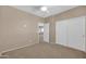 Bedroom with plush carpet and double-door closet at 2987 E Powell Way, Gilbert, AZ 85298