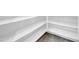 Close-up view of closet shelving in a room with tiled flooring at 2987 E Powell Way, Gilbert, AZ 85298
