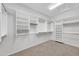 Large walk-in closet with custom shelving and ample storage for clothes and accessories at 2987 E Powell Way, Gilbert, AZ 85298