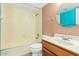 A bathroom featuring a tub-shower combination, single sink, and neutral color scheme at 3031 N Civic Center Plz # 205, Scottsdale, AZ 85251